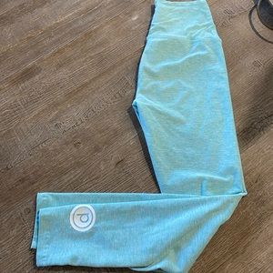 Beyond Yoga  leggings with Pure Barre logo.